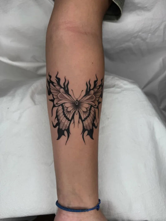 Blackwork Butterfly on Women Forearm Tattoo by @facundo.erpen