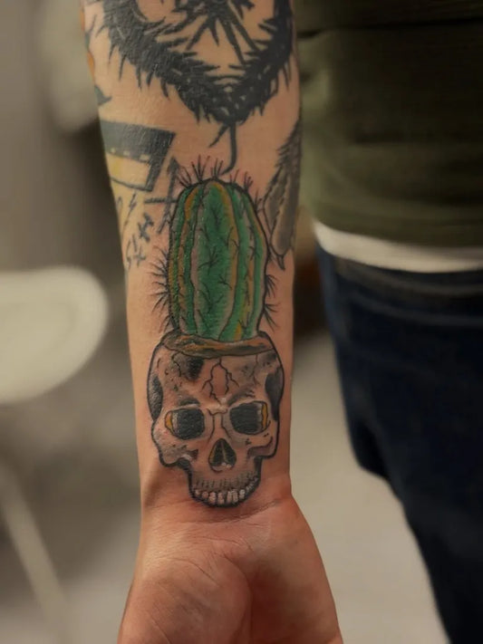 Medium Blackwork Cactus Skull Tattoo on Men Wrist by @luckyricktattoos