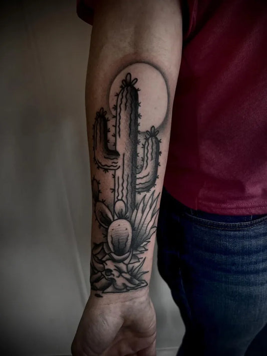 Medium Blackwork Cactus and Moon Tattoo on Men Arm by @tattoosby_justingahn