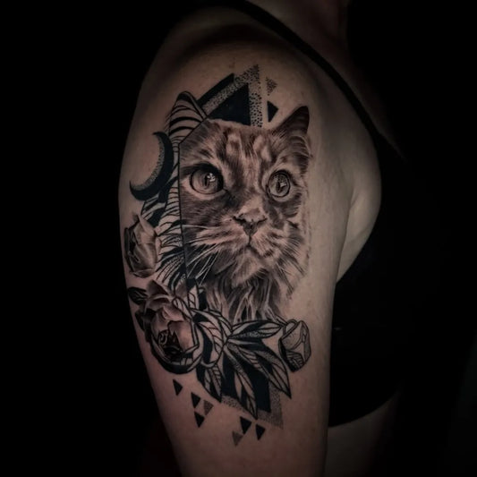 Medium Blackwork Cat Roses Tattoo on Women Shoulder by @sophiabrowntattoos
