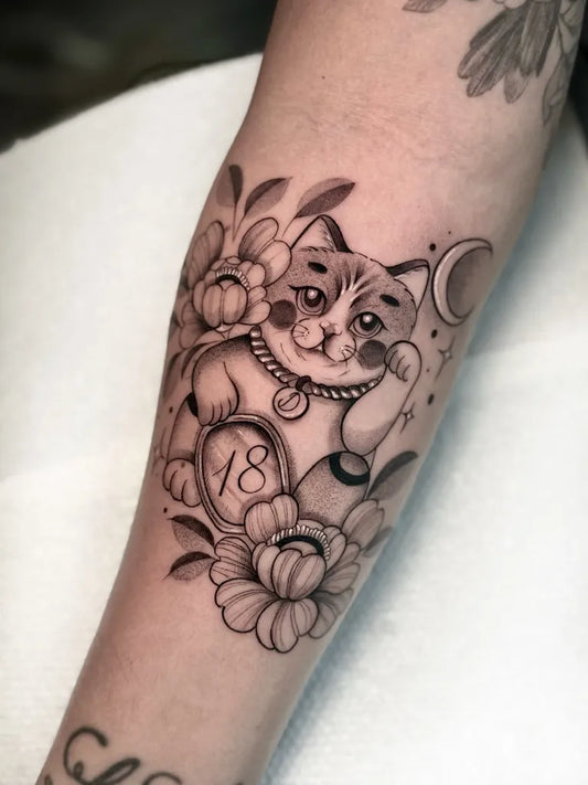 Medium Blackwork Cat and Flowers Tattoo on Women Arm by @littlemustangg