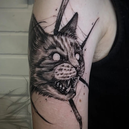Medium Blackwork Cat with Spikes on Men Arm Tattoo by @julianmoth_
