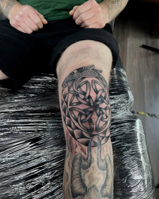 Medium Blackwork Celtic Knot Tattoo on Men Knee by @eyecatchertattoos