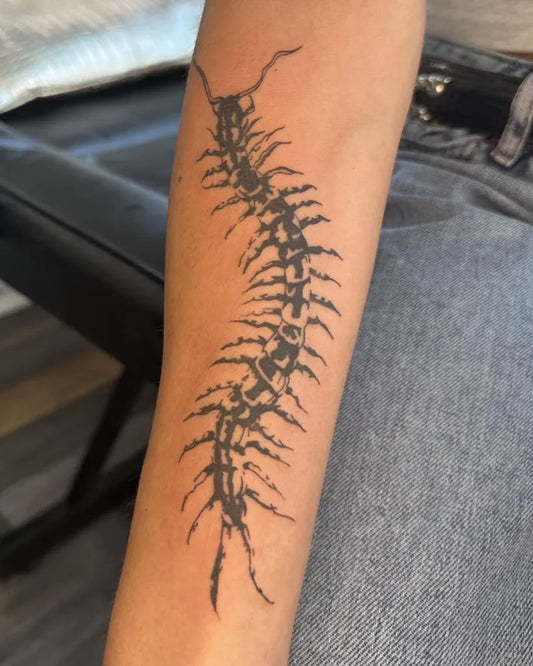 Medium Blackwork Centipede Tattoo on Men Arm by @gay_penguin_piercing_tattoo