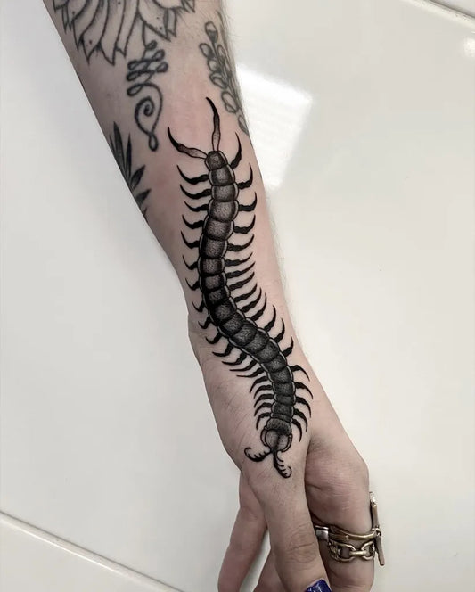 Medium Blackwork Centipede Tattoo on Women Arm by @oni_bat__
