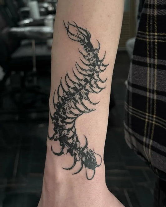Medium Blackwork Centipede Tattoo on Women Arm by @prismatattoo