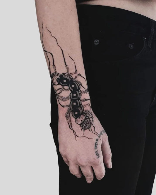 Medium Blackwork Centipede Tattoo on Women Forearm by @covenant.lisboa