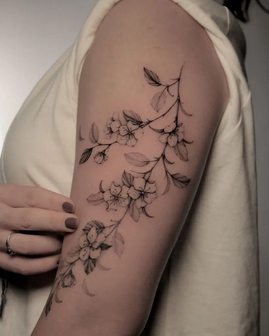 Medium Blackwork Cherry Blossom Branch on Women Arm Tattoo by @yo_soy_vago