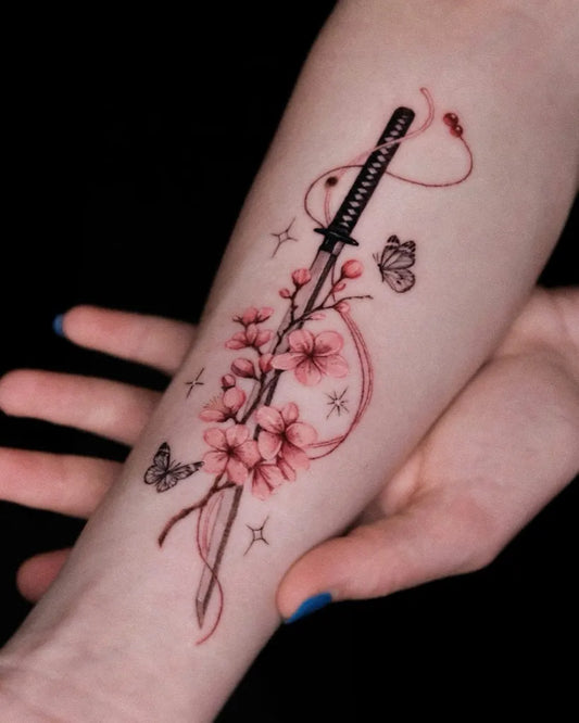 Medium Blackwork Cherry Blossom Katana Butterfly on Women Arm Tattoo by @da.an_tattooer
