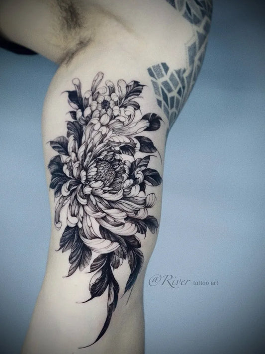 Medium Blackwork Chrysanthemum Leaves Tattoo on Men Thigh by @rivertattooart