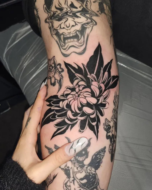 Medium Blackwork Chrysanthemum Leaves Tattoo on Women Arm by @katanakid_tattoo