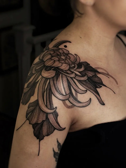 Medium Blackwork Chrysanthemum Leaves Tattoo on Women Shoulder by @soltatua