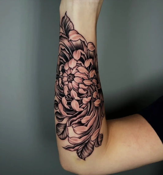 Medium Blackwork Chrysanthemum Tattoo on Women Arm by @connorrudytattoos