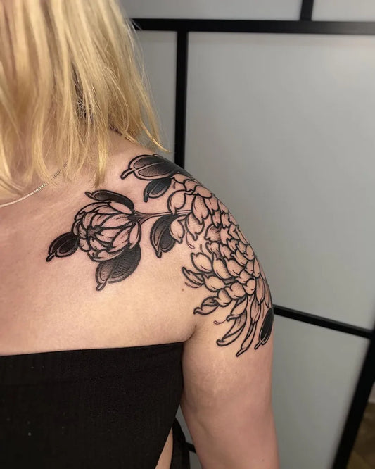 Medium Blackwork Chrysanthemum Tattoo on Women Shoulder by @pip.fox.tattoos