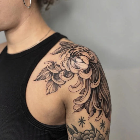 Medium Blackwork Chrysanthemum Tattoo on Women Shoulder by @sophiemoonbasetattoo