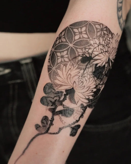 Medium Blackwork Chrysanthemum and Mandala Tattoo on Women Arm by @e.o.orient