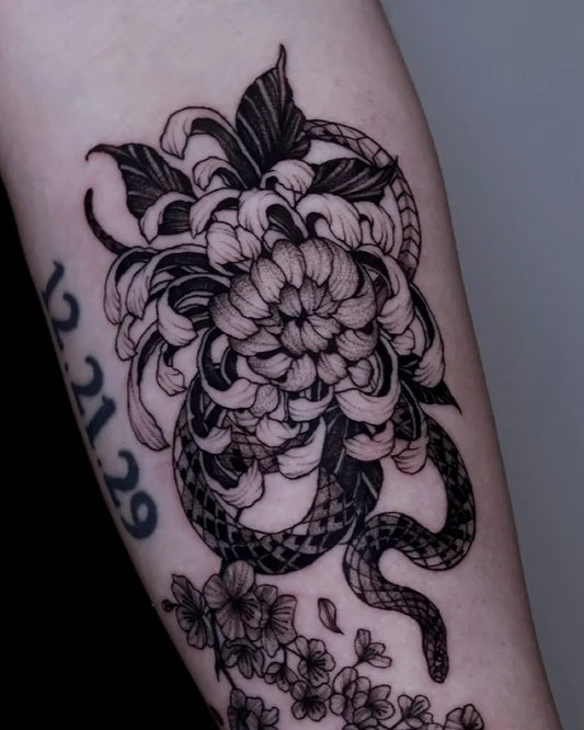 Medium Blackwork Chrysanthemum and Snake Tattoo on Women Arm by @zuxgos