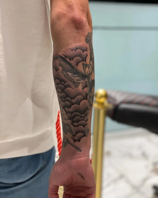 Medium Blackwork Clouds and Bird Tattoo on Men Arm by @civantattoo