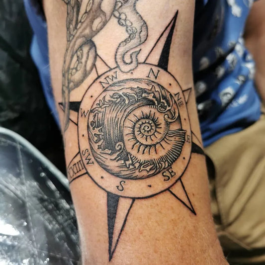 Medium Blackwork Compass Shell Octopus Nautical Tattoo on Men Arm by @deannorthtattoos