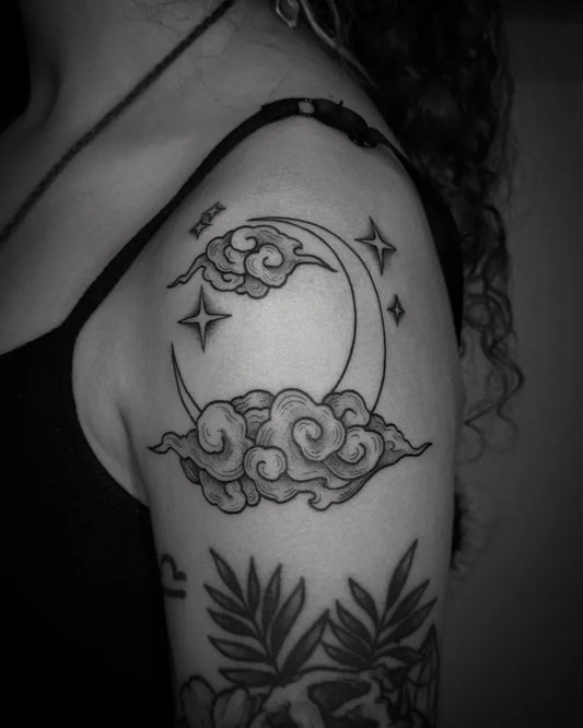 Medium Blackwork Crescent Moon and Clouds Tattoo on Women Shoulder by @chadillac_green