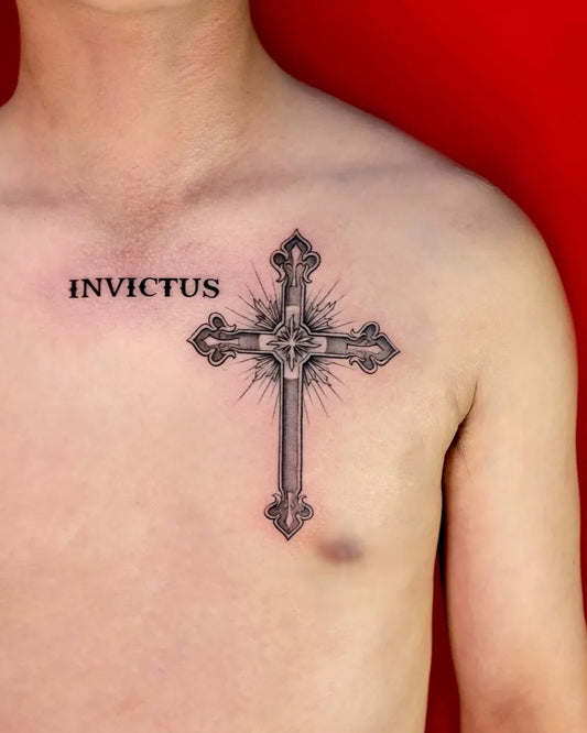 Medium Blackwork Cross Invictus on Men Chest Tattoo by @dragoncityink.danang