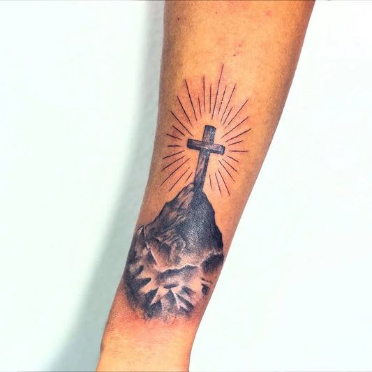 Medium Blackwork Cross Mountain on Men Arm Tattoo by @im.medusa_