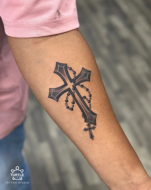 Medium Blackwork Cross Rosary Beads on Men Arm Tattoo by @turtleinktattoostudio