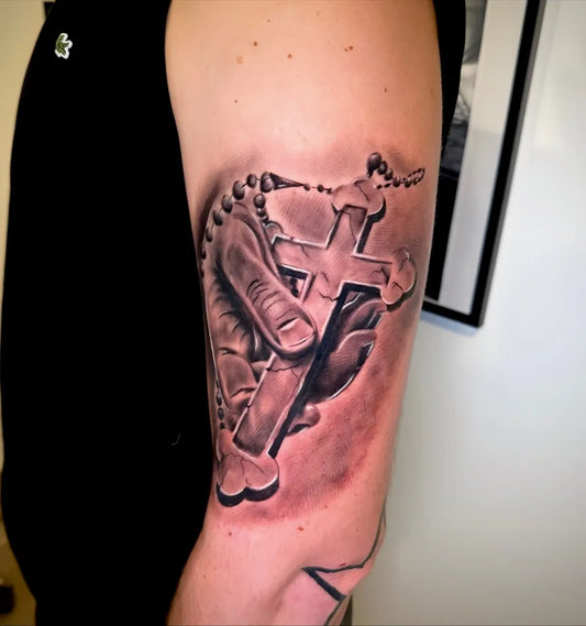 Medium Blackwork Cross Rosary Hand on Men Arm Tattoo by @as.tattoo.studio