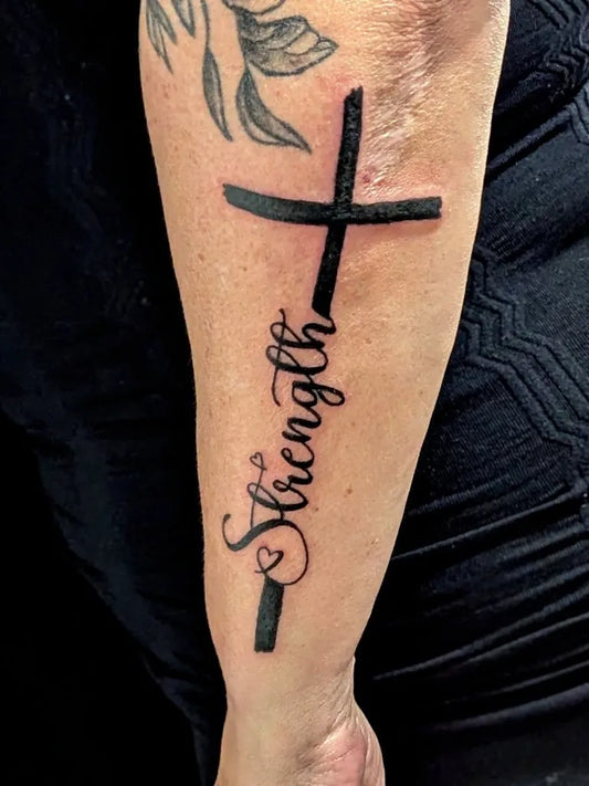 Medium Blackwork Cross Strength Heart on Women Arm Tattoo by @candiceperryart