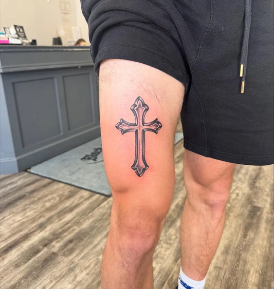 Medium Blackwork Cross on Men Thigh Tattoo by @bbgirl.tattoos