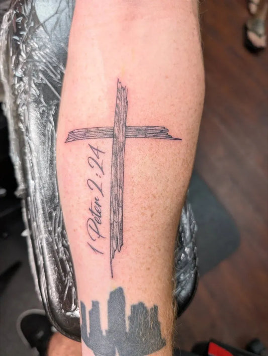 Medium Blackwork Cross with 1 Peter 2 24 and Skyline on Men Arm Tattoo by @victor_ghast