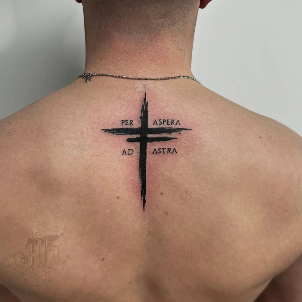 Medium Blackwork Cross with Latin Text on Men Back Tattoo by @juniortattoostudiogalway