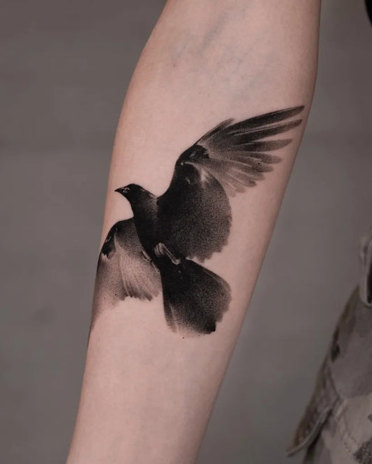 Medium Blackwork Crow Tattoo on Women Arm by @newtattoo_studio