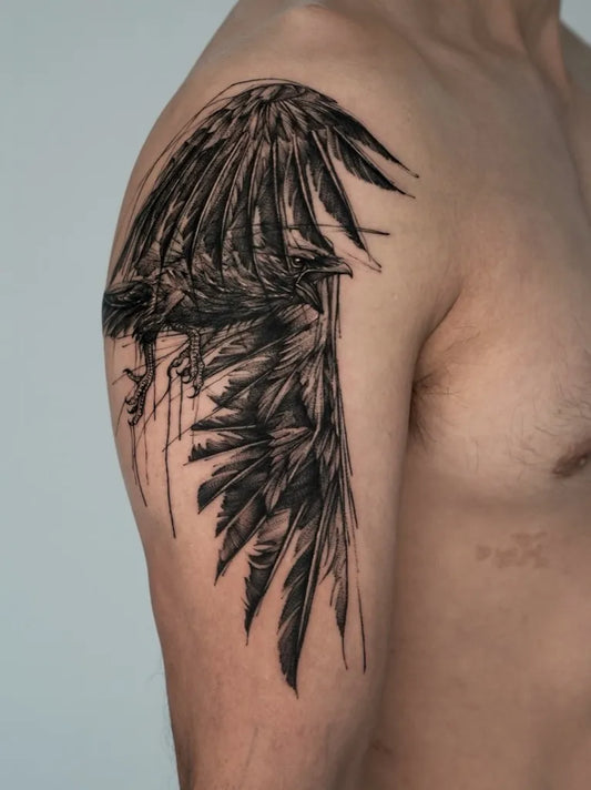 Medium Blackwork Crow Wing Tattoo on Men Shoulder by @bk_tattooer