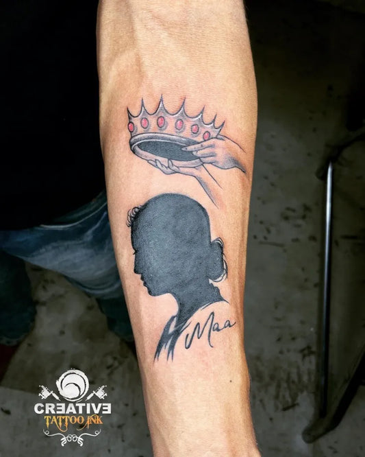 Medium Blackwork Crown Hand Silhouette Tattoo on Men Arm by @creative_tattoo_art_gallery