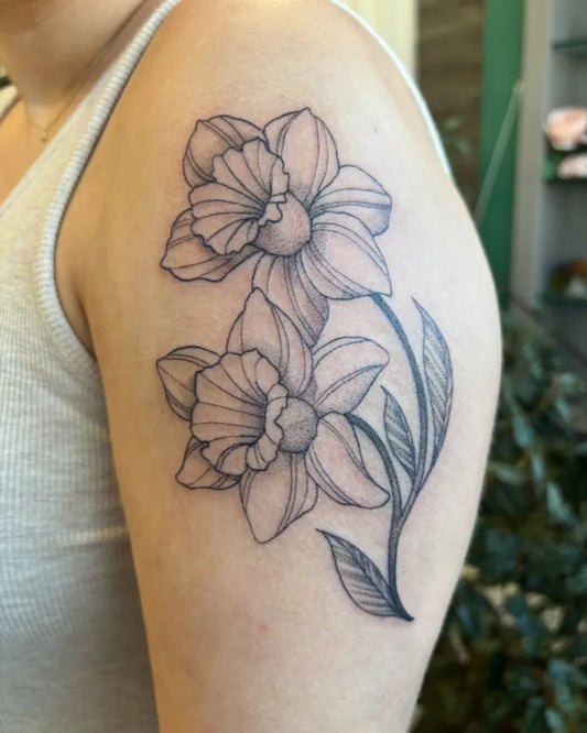 Medium Blackwork Daffodils Tattoo on Women Shoulder by @beccabootattoos