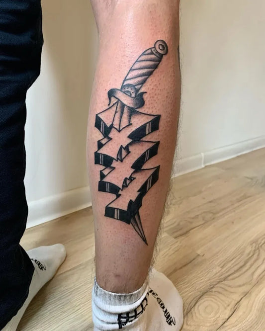 Medium Blackwork Dagger 777 Tattoo on Men Leg by @turysta_tattoo