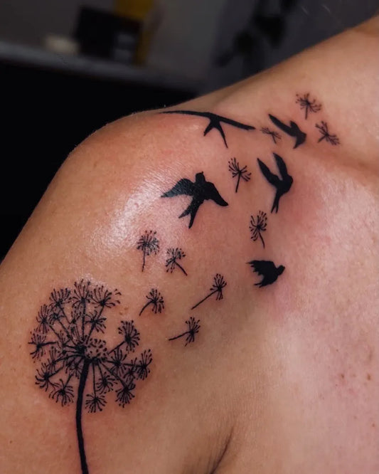 Medium Blackwork Dandelion and Birds Tattoo on Women Shoulder by @izyinks_