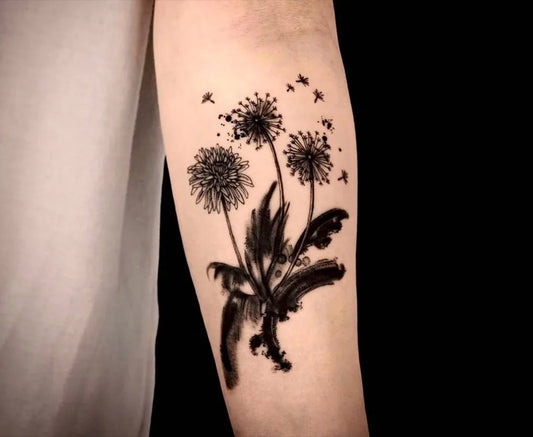 Medium Blackwork Dandelion and Seeds Tattoo on Women Arm by @xiael_tattooer