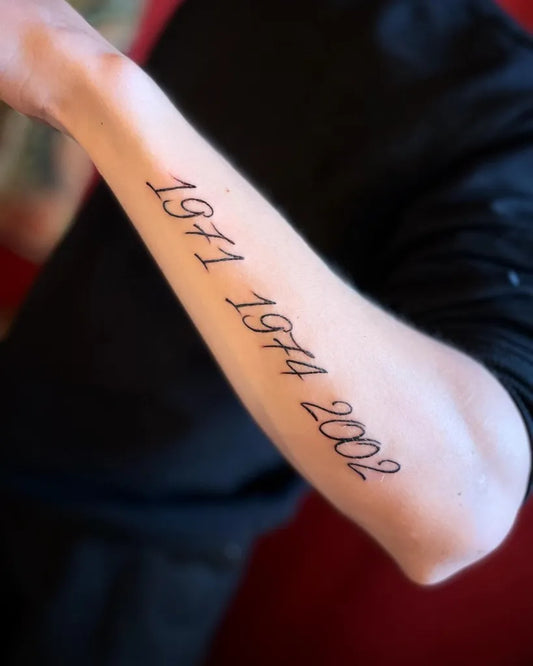 Medium Blackwork Dates 1971 1974 2002 Tattoo on Men Arm by @ateljearkosund