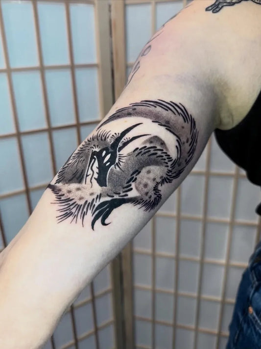 Medium Blackwork Demon Dragon Tattoo on Women Arm by @nythera.ink