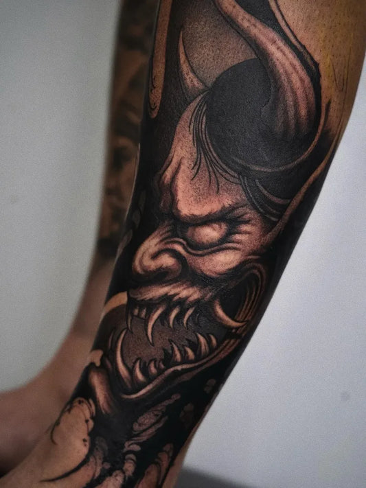 Medium Blackwork Demon Face Tattoo on Men Leg by @blxcoxttt