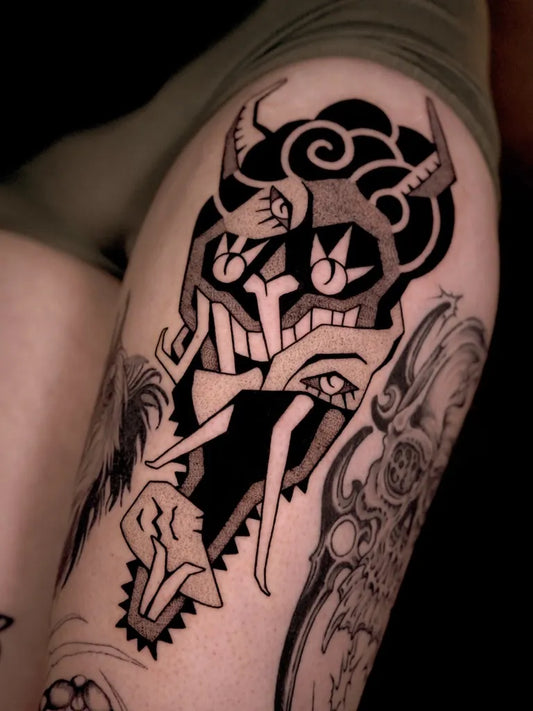 Medium Blackwork Demon Mask Tattoo on Women Thigh by @satanischepferde