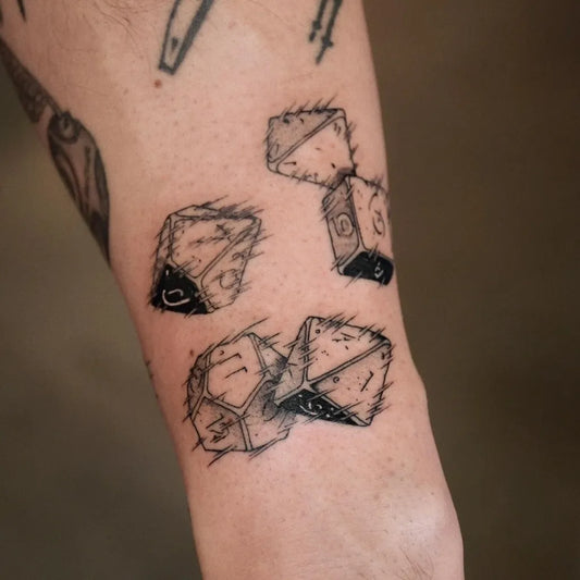 Medium Blackwork Dice Tattoo on Men Arm by @gary.tattooer
