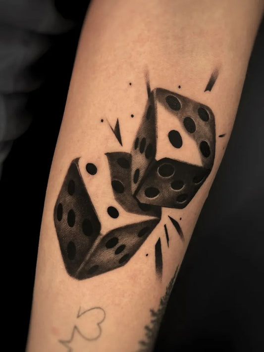 Medium Blackwork Dice Tattoo on Women Arm by @moomink_tattoo