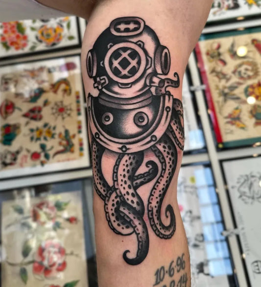 Medium Blackwork Diving Helmet and Octopus Nautical Tattoo on Men Upper Arm by @hardtravelinmayne