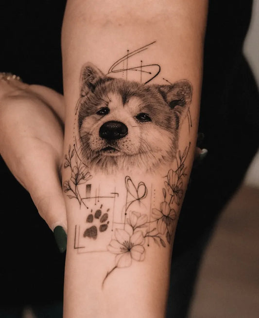 Medium Blackwork Dog Flowers Tattoo on Women Arm by @_nico.nic_