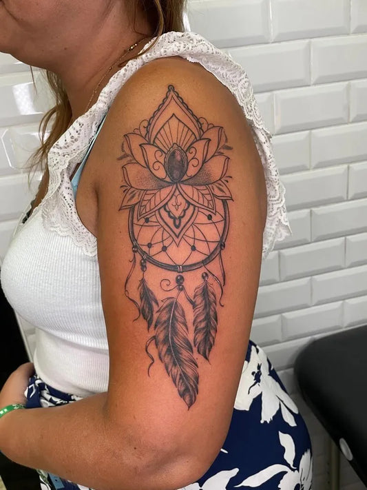 Medium Blackwork Dream Catcher Lotus Tattoo on Women Shoulder by @crazytattoocapdagde