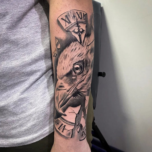 Medium Blackwork Eagle Clock on Men Arm Tattoo by @juan_pelaytay.art