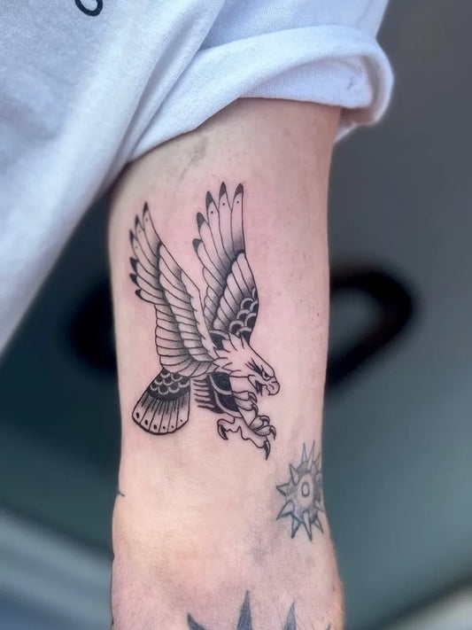 Medium Blackwork Eagle Tattoo on Men Arm by @mariavarneytattoo